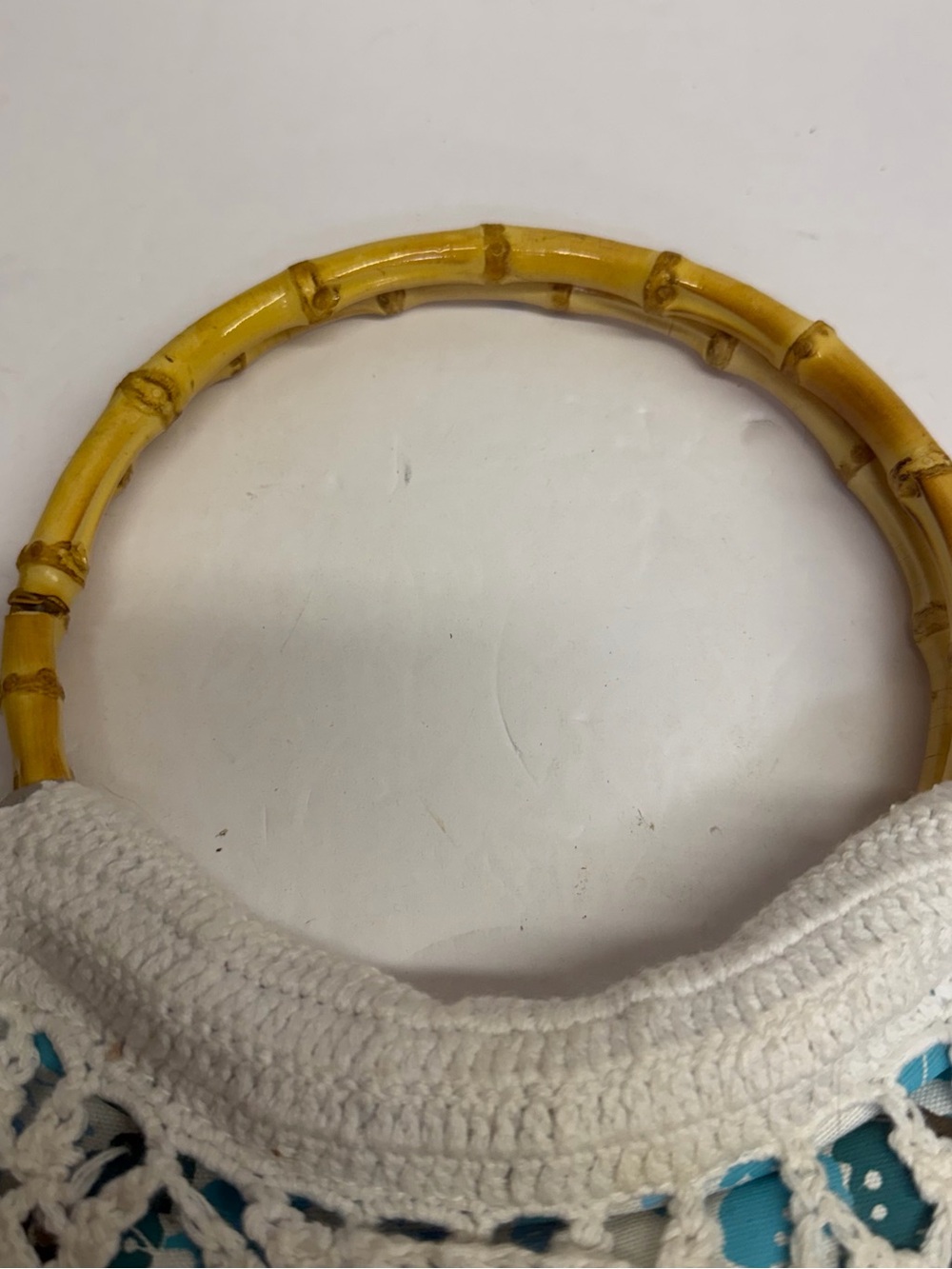 Lilu White Crochet Purse with teal and‎ gray floral underlay Bamboo Handles. - Picture 5 of 10
